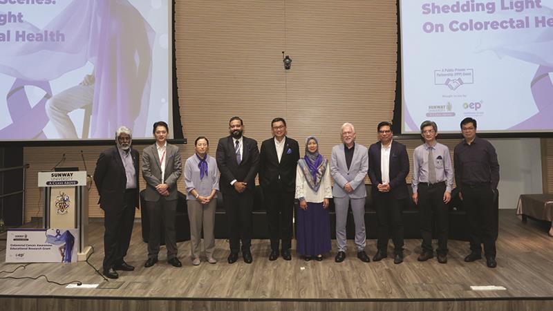 Dr Nor Saleha Ibrahim Tamin (5th from the right) with panellists at the public forum on colorectal health.