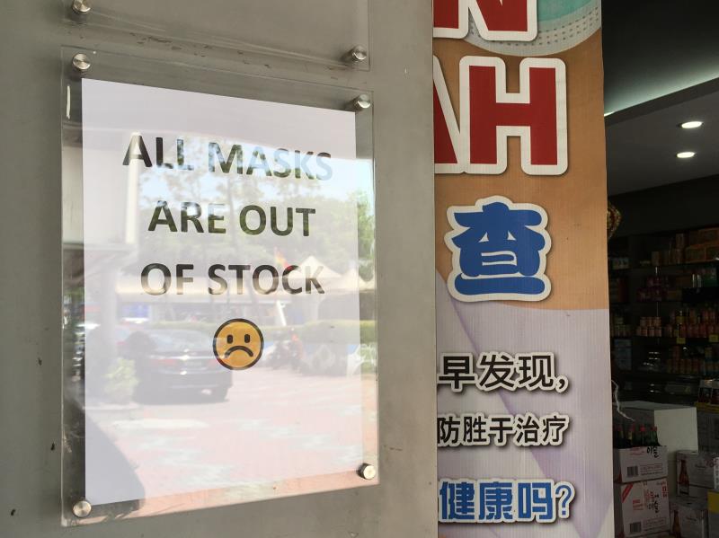 A sign on display outside a community pharmacy in the Klang Valley area.