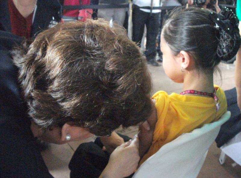 Nine-year-old student in Philippines gets dengue vaccination at the launch of the first mass vaccination in the world. Photo: