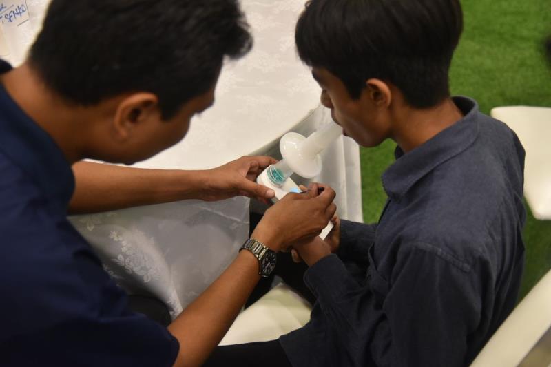 A boy going through a lung spirometry test to check his lung capacity.