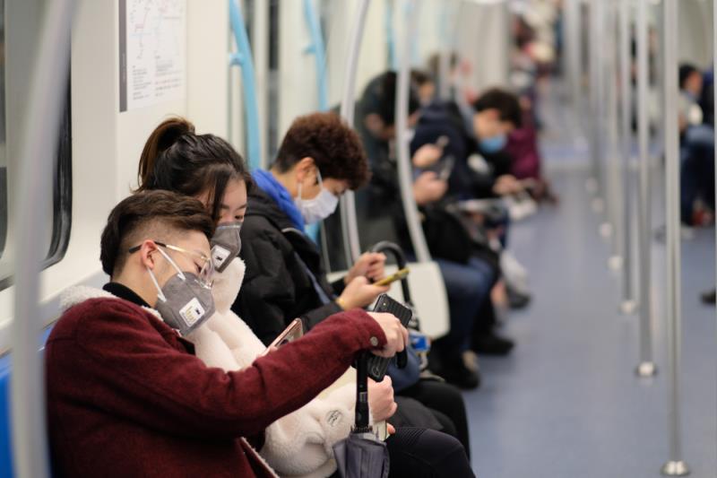 Passengers on a Shanghai train during the 2019-nCoV coronavirus outbreak. (Image credit: Robert Wei/Shutterstock)