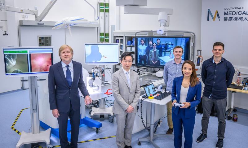 Prof Bradley Nelson (1st from left) and his team (right), Prof Philip Chiu (2nd from left), Dr Shannon Chan (2nd from right)