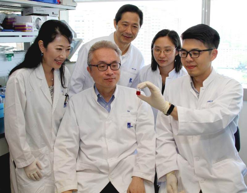 The research team at IBN that developed the green tea nanocarriers. Clockwise from right: Dr Kun Liang, Dr Motoichi Kurisawa,