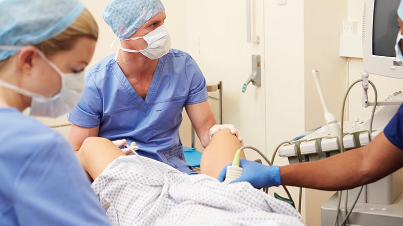 A stock photo of a woman having her eggs removed.